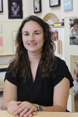 Picture of Jamie Cown in a preschool kitchen play area